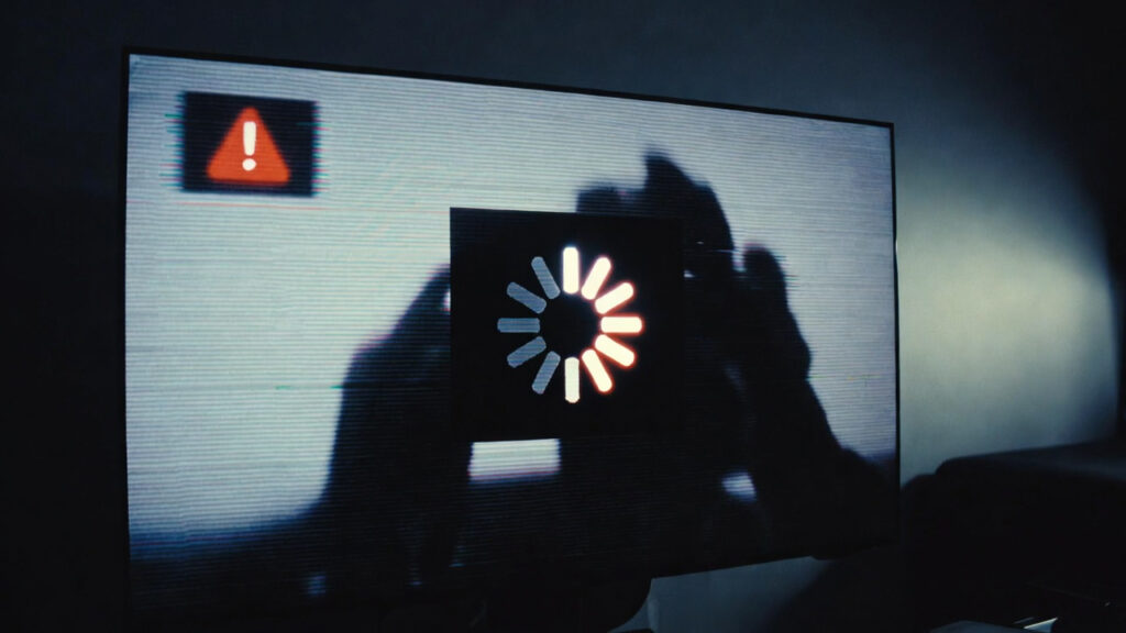 Aplicativo de TV travando no celular com símbolo de carregamento